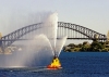 Australia - Sydney (NSW): tug boat show and Harbour Bridge - water jets (photo by A.Walkinshaw)