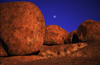 Devil's Marbles Conservation Reserve, NT, Australia: rounded boulders and moon - photo by Y.Xu