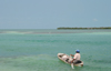 Belize - Caye Caulker - Ambergris Caye: me, my God, my dreams - canoe - lonely fisherman on the caribean sea - Caribbean Sea - photo by C.Palacio