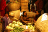 Bhutan - Thimphu - the market - women in traditional clothes - selling vegetables - photo by A.Ferrari