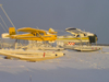Northwest Territories, Canada: two float planes - Murphy Rebel C-GDAF, and de Havilland Beaver (DHC2) C-FGYN, Adlair Aviation - amphibious floats - photo by Air West Coast