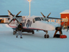 Fort Good Hope, Northwest Territories, Canada: preparing a Dornier 228 in cold weather - Summit Air - photo by Air West Coast