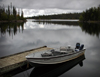 Canada / Kanada - Saskatchewan: fishing boat - reflections in the water - photo by M.Duffy