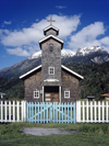 Aisn region, Chile: wooden church with white picket fence and blue gate on the camino austral  wooden shingles - Patagonia - photo by C.Lovell