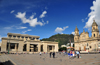 Bogota, Colombia: life of Bolivar square - Plaza de Bolivar - Justice Palace and Cathedral - Monserrat hill in the background - La Candelaria - photo by M.Torres