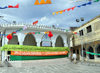 Moroni, Grande Comore / Ngazidja, Comoros islands: Place de Badjanani - Sultan Ahmed mosque - banner announcing a 'grand mariage' - photo by M.Torres