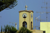 Crete - Malia: clock tower and antennas (photo by A.Dnieprowsky)