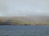 Crozet islands - Possession island: the coast - white buildings of the French scientific station (photo by Francis Lynch)