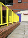 UK - England - Ellesmere Port: yellow railings and purple door, Cheshire Oaks Designer Outlet Centre - photo by D.Jackson
