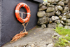 Elduvik village, Eysturoy island, Faroes: lifebuoy and stone wall - photo by A.Ferrari