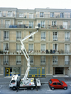 Le Havre, Seine-Maritime, Haute-Normandie, France: Cantilever Crane - painting a building - photo by A.Bartel