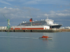 Le Havre, Seine-Maritime, Haute-Normandie, France: Queen Mary 2 and Gendermerie Maritime boat - Normandy - photo by A.Bartel