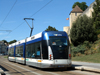 Caen, Calvados, Basse-Normandie, France: tram under the ramparts - the 'tramway' is in fact a guided-bus system built by Bombardier - photo by A.Bartel