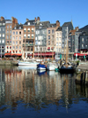 Honfleur, Calvados, Basse-Normandie, France: entrance to the Vieux Bassin, the old harbour - buildings on Quai Sainte-Catherine - photo by A.Bartel