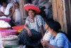 Guatemala - Santiago Atitlan (Solola province): market with woman wearing the traditional halo headdress - as pictured on one of the Guatemalean coins (photographer: Mona Sturges)