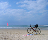 Israel - Kibbutz Sdot Yam: waiting for its master - bike on the beach - photo by Efi Keren