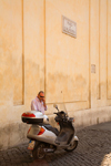 Rome, Italy: Local man on mobile phone in Piazza San Silvestro - photo by I.Middleton