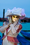 Carnival participant with Carnival costume at Dawn by Canale di San Marco, Venice - photo by A.Beaton