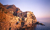 Italy / Italia - Manarola - Cinque Terre -  comune of Riomaggiore, province of La Spezia, Liguria: the town and the sea - UNESCO World Heritage Site - National Park of the Cinque Terre - photo by W.Allgwer