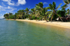 Vohilava, le Sainte Marie / Nosy Boraha, Analanjirofo region, Toamasina province, Madagascar: coconut trees abd huts along the beach front - photo by M.Torres