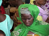 Mali - Mopti: woman in Islamic green - at the market - photo by A.Slobodianik