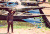 Segou: toddler looking at the boats in the port (photo by Nacho Cabana)