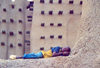 Djenne: boy sleeping at the mosque (photo by Nacho Cabana)