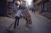 Kathmandu, Nepal: bike transporting eggs to the market - street scene - photo by W.Allgwer