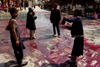 Kathmandu, Nepal: kids throwing paint at Holi festival - Hinduism - photo by G.Koelman