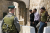 Hebron, West Bank, Palestine: Palestinians wait for clearance at checkpoint - photo by J.Pemberton