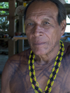 Panama - Chagres National Park: Embera Drua man with necklace - photo by H.Olarte