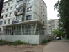Russia - Udmurtia - Izhevsk: apartment building and food shop - photo by P.Artus