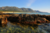 Portixeddu, Fluminimaggiore, Carbonia-Iglesias province, Sardinia / Sardegna / Sardigna: the beach - rocks and emerald waters of the Golfo del Leone - photo by M.Torres