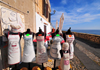 Alghero / L'Alguer, Sassari province, Sardinia / Sardegna / Sardigna: custom embroided aprons for sale - shop near St. Elmo bastion - La Muralla - photo by M.Torres