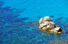 Porto Sa Ruxi, Villasimius municipality, Cagliari province, Sardinia / Sardegna / Sardigna: rocks on Golfo di Carbonara - blue and transparent water of the Mediterranean Sea - scoglio - photo by M.Torres