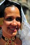 Cagliari, Sardinia / Sardegna / Sardigna: Feast of Sant'Efisio / Sagra di Sant'Efisio - beautiful Sardinian face - young woman in traditional attire from Selargius - photo by M.Torres