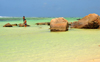 Mahe, Seychelles: Anse Royal - shallow water and boulders - photo by M.Torres