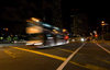 Singapore: bus on an intersection - nocturnal - photo by P.Jolivet