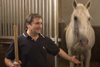 Slovenia - Lipica - Goriska region: Lipica stud farm - in the stables - lipizzaner horse and worker - photo by I.Middleton