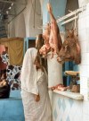 Tunisia / Tunisia / Tunisien - Keirouan: Arab lady at the halal butcher (photo by Miguel Torres)