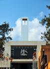 Kampala, Uganda: Parliament of the Republic of Uganda, Nakasero hill - tower, Ugandan flags and coat of arms - photo by M.Torres