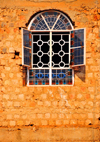 Kampala, Uganda: church window on Kikaya Hill - crude masonry wall - photo by M.Torres