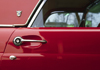USA: door detail of a 1957 red Ford Thunderbird - vintage car - photo by C.Lovell