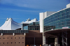 Denver, Colorado, USA: Denver International Airport - skybridge bridge between the Jeppesen terminal and Concourse A - membrane roof in the background - designed by Fentress Bradburn Architects - photo by M.Torres