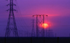 USA - power lines at sunset - pylons - electric power transmission - transmission towers or masts - photo by J.Fekete