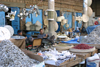 Yemen - Taizz - the suq - mixture of dried fish, baskets and kitchen ware - photo by E.Andersen