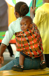 Livingstone: waiting for a bus - curious toddler - photo by J.Banks