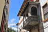 Stone Town, Zanzibar, Tanzania: decorated balcony over Suicide alley - Shangani - photo by M.Torres