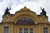 painting and statues on a facade - Prague, Czech Republic - photo by H.Olarte