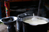 Khorgo-Terkhiin Tsagaan Nuur NP, Mongolia: preparing yak cheese in a ger - photo by A.Ferrari